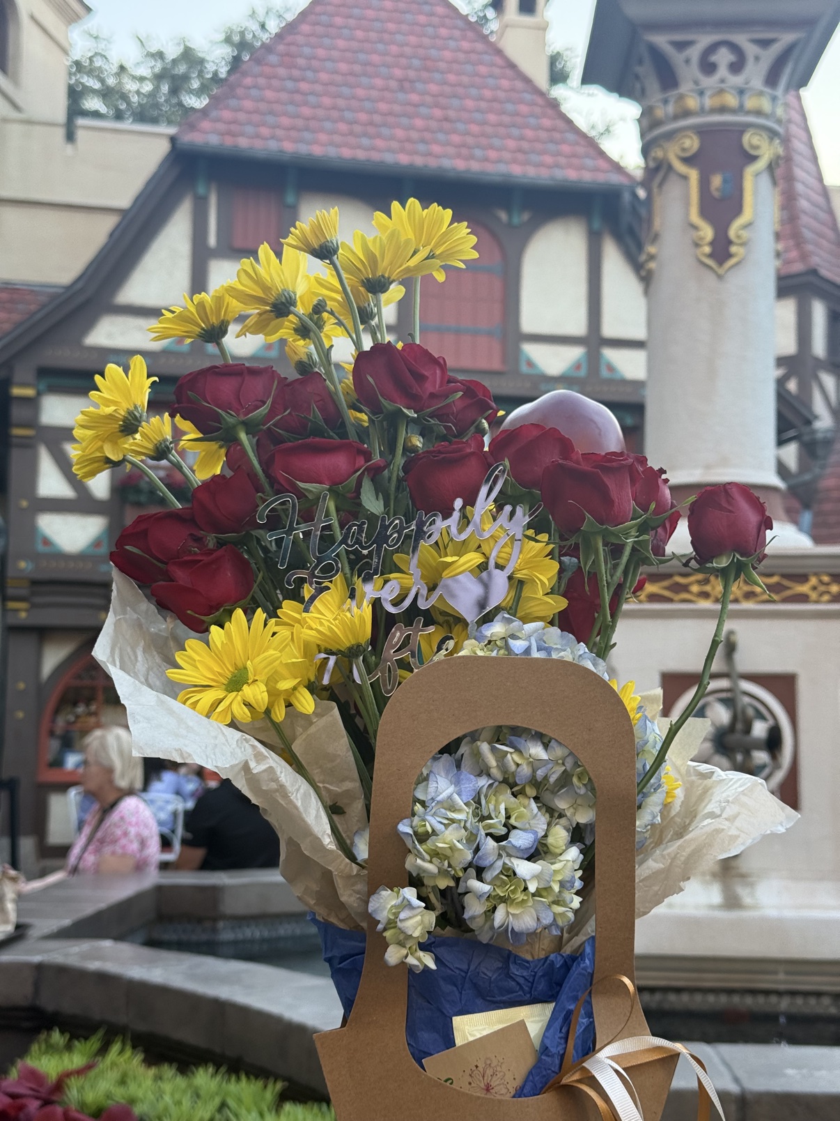 Close view of the Fairest One bouquet in front of the fountain at EPCOT's Germany pavilion