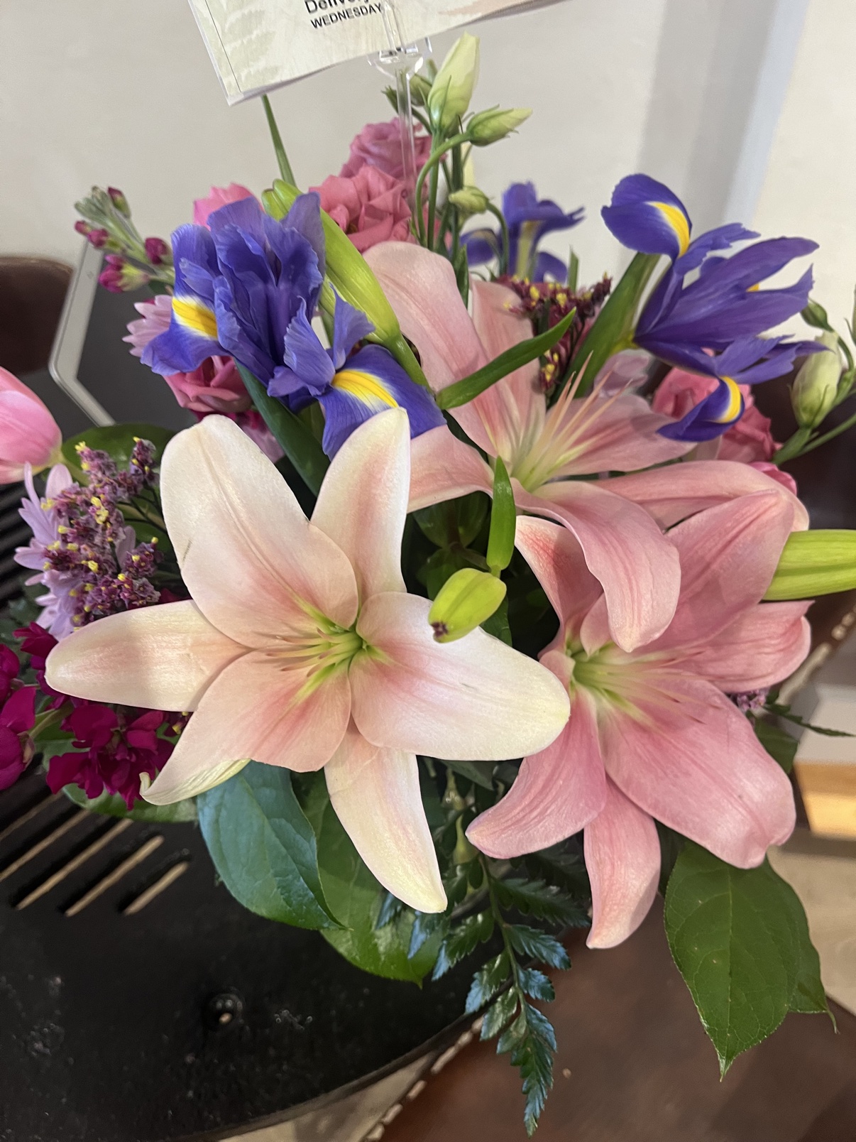 Pink lily and purple iris arrangement