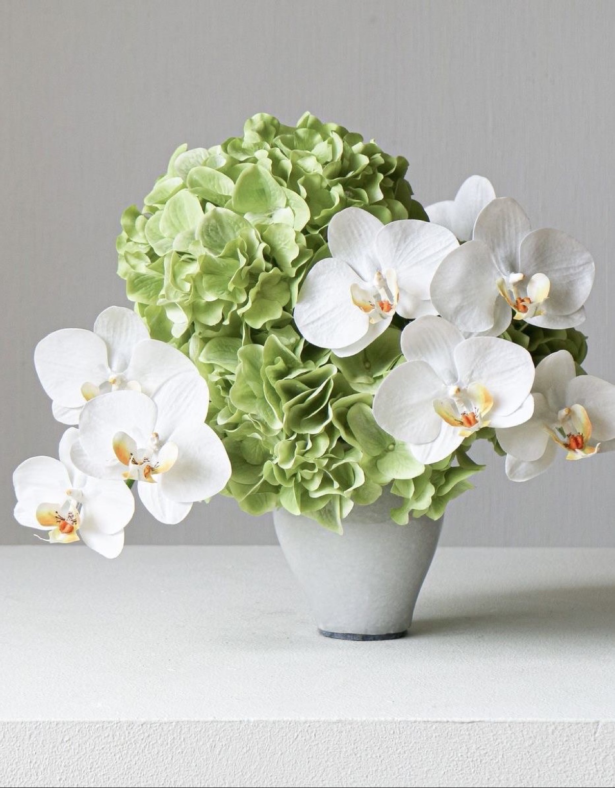 Hydrangea and orchid arrangement